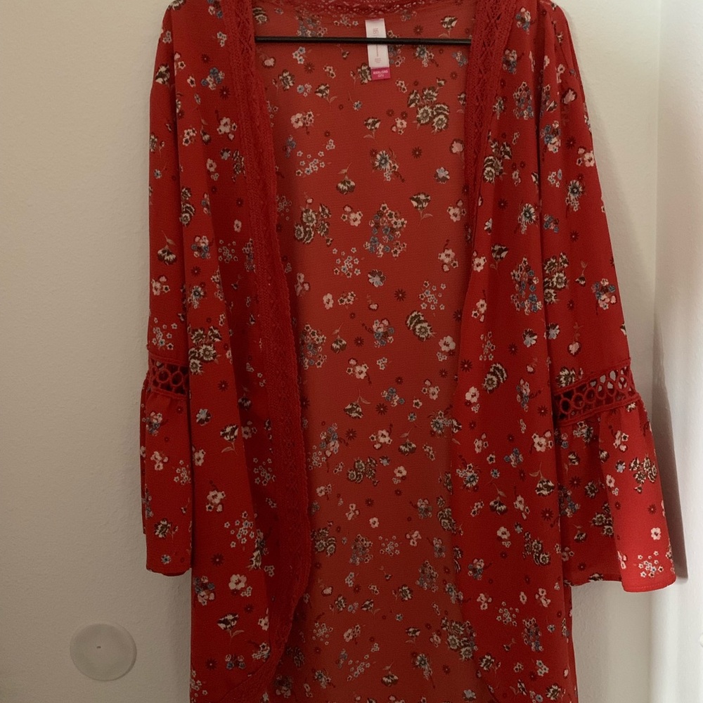 Red floral cardigan.